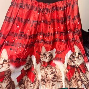 Red and black Christmas dress with cats and musical notes